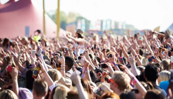 Huge crowd at a festival protected with public liability insurance.