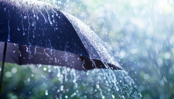 Rain running off an umbrella during an outdoor event insured by Event Insurance Direct.