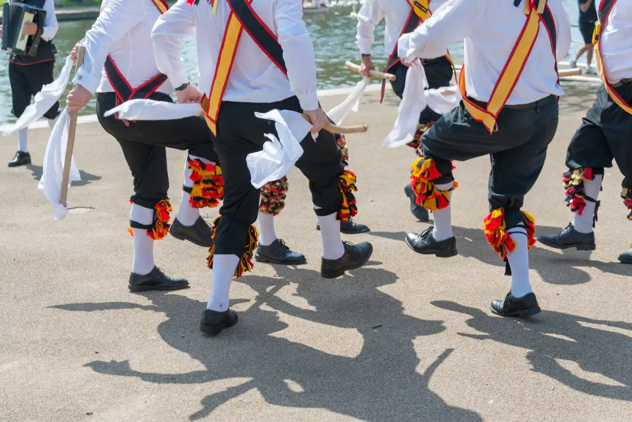 Morris dancers performing at an outdoor carnival