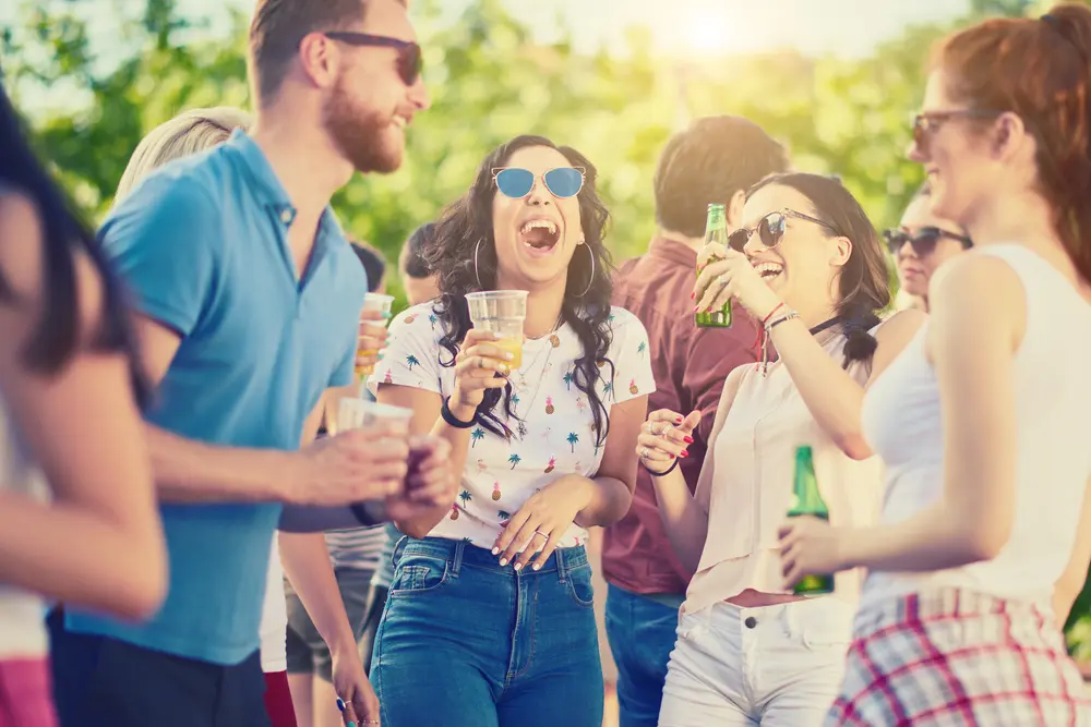 Guests socialising at an outdoor event